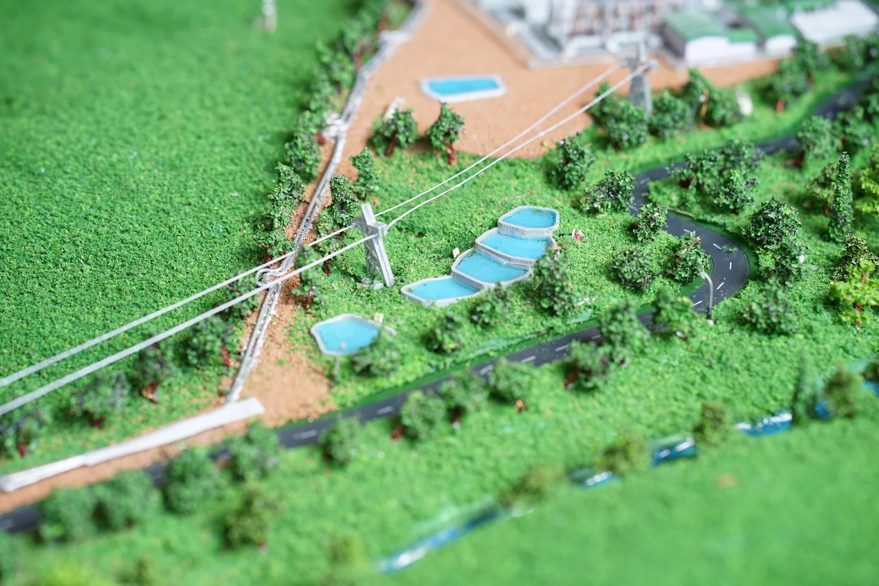Aerial facility and road detail in Muara Laboh diorama.