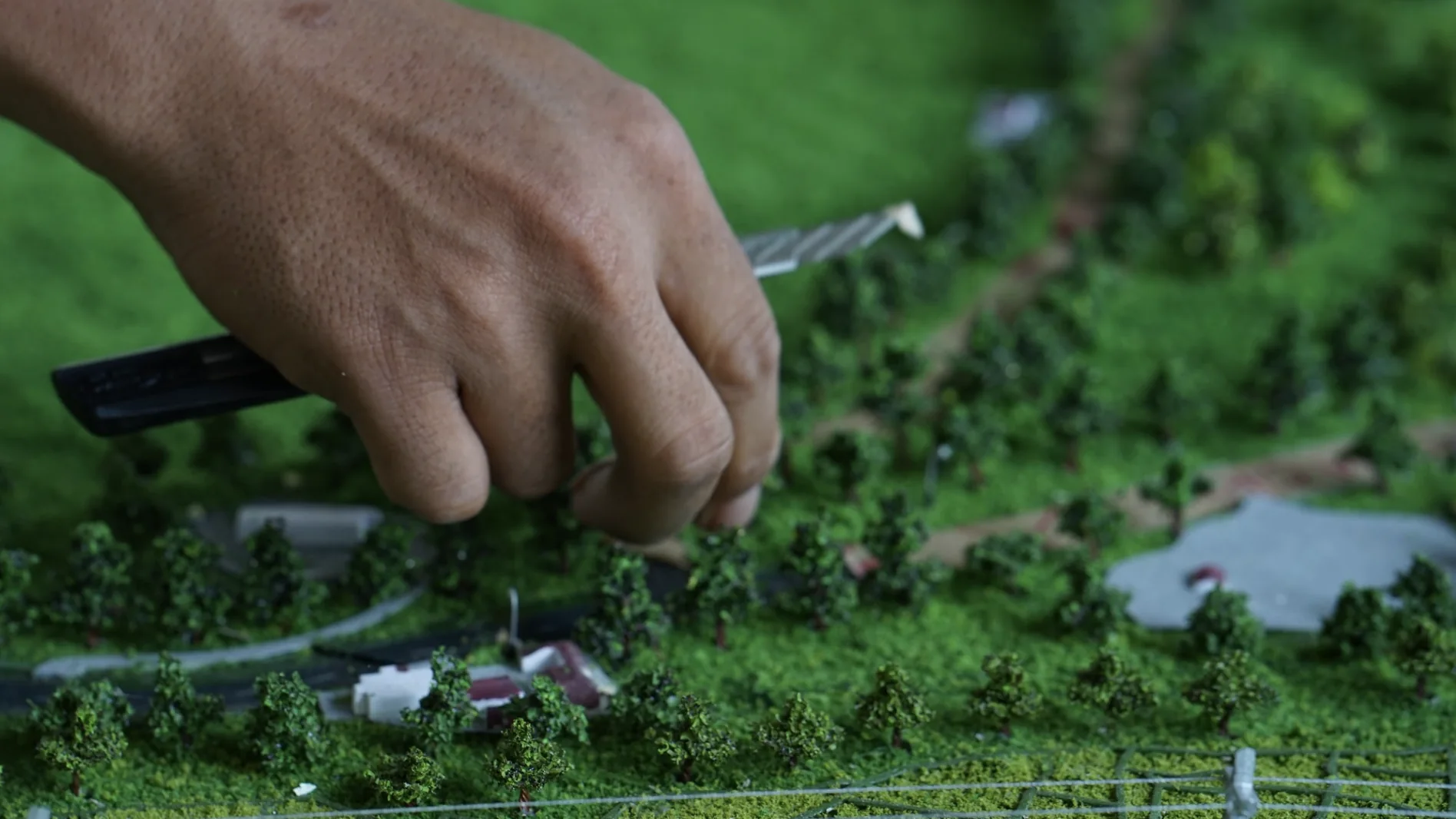 Handcraft detail on Muara Laboh landscape model.